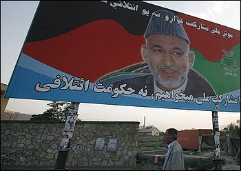 An election billboard of Afghan President Hamid Karzai, who is also a presidential candidate, is seen in Kabul, Afghanistan, Tuesday, Aug. 25, 2009. The Afghan government is prepared to respond to any violence in reaction to the results of last week's election, the president's spokesman said Tuesday, just hours ahead of the release of partial voting returns. (AP Photo/Musadeq Sadeq)